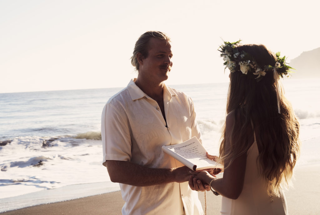 Dylan and Keana exchange their vows on black sand beach